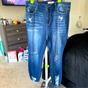 Distressed denim jeans